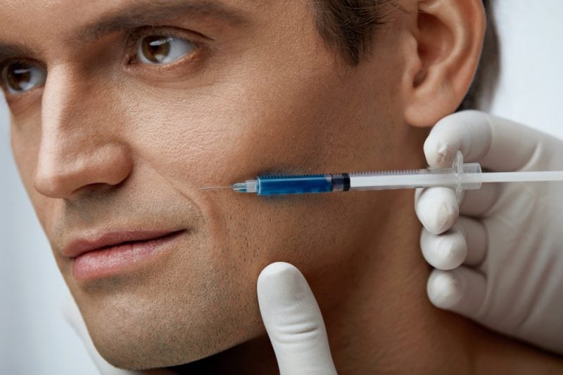 Image of male getting Botox treatment